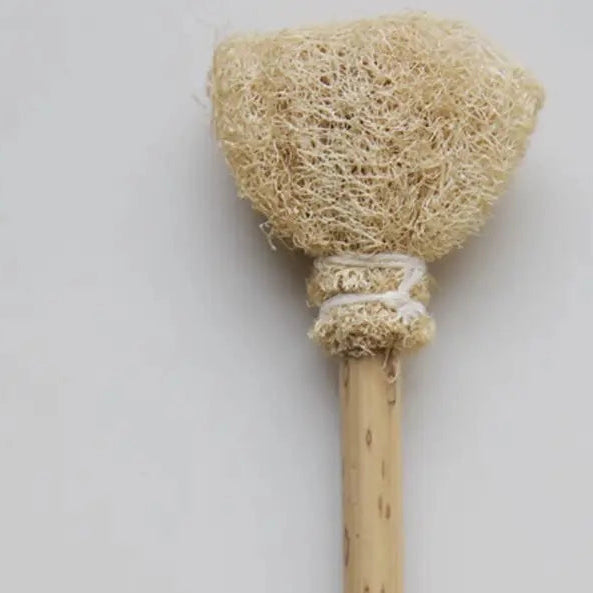 Natural bristle brush on a marble surface