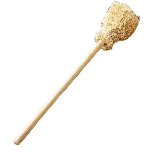 Wooden mallet with a textured head on a wooden surface
