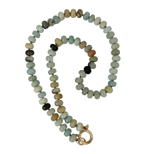 Beaded necklace with a gold clasp on a white background